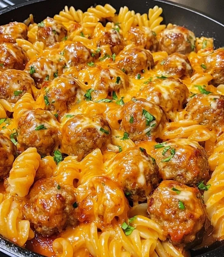 BBQ Ranch Meatball & Cheddar Pasta Skillet served in a cast iron pan.