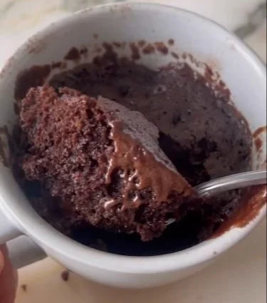 Delicious chocolate mug cake served in a ceramic mug