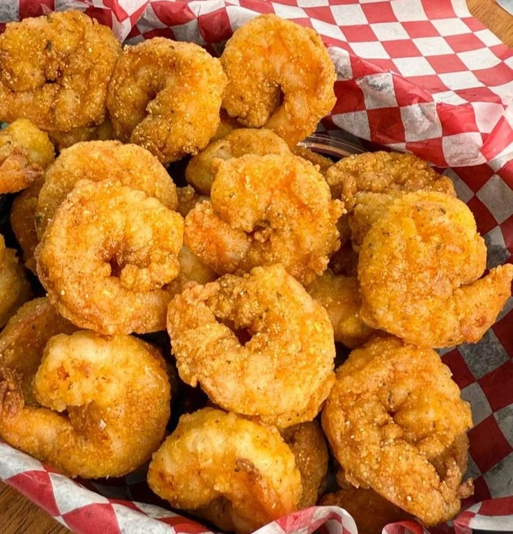 Plate of crispy fried shrimp served with dipping sauce