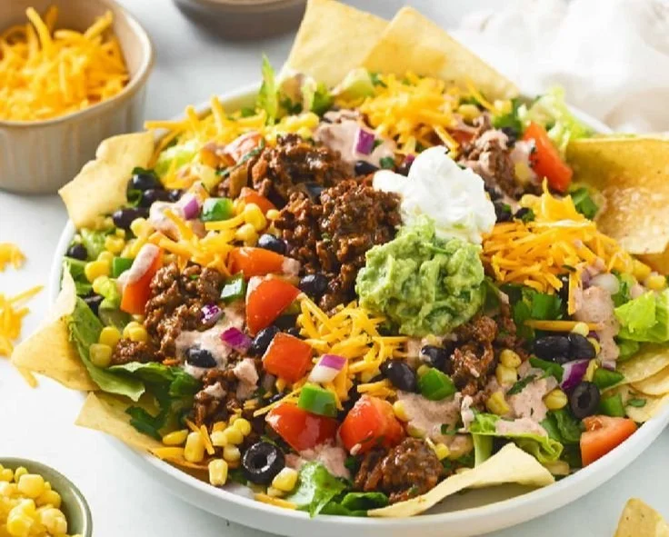 Delicious easy taco salad with fresh ingredients in a colorful bowl