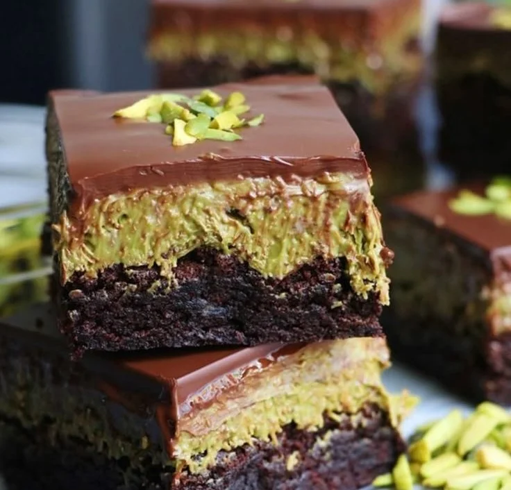 Delicious pistachio kunafa chocolate brownies served on a plate