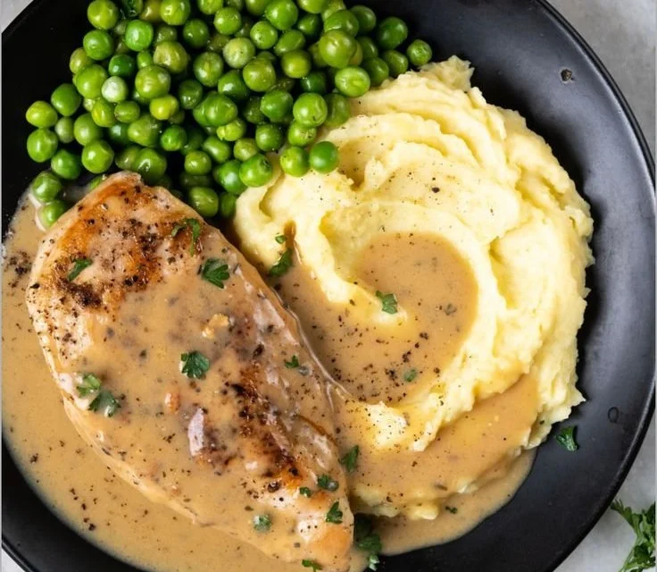 Delicious Ranch Chicken served on a plate with herbs and spices