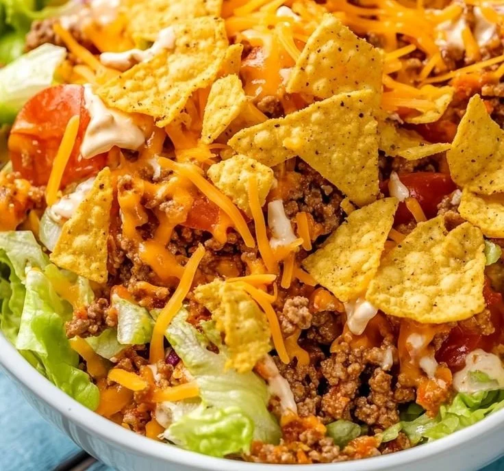 A vibrant bowl of Simple Doritos Taco Salad with colorful ingredients