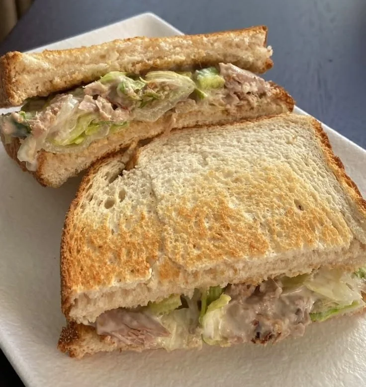 Delicious spicy tuna sandwiches stacked with fresh ingredients