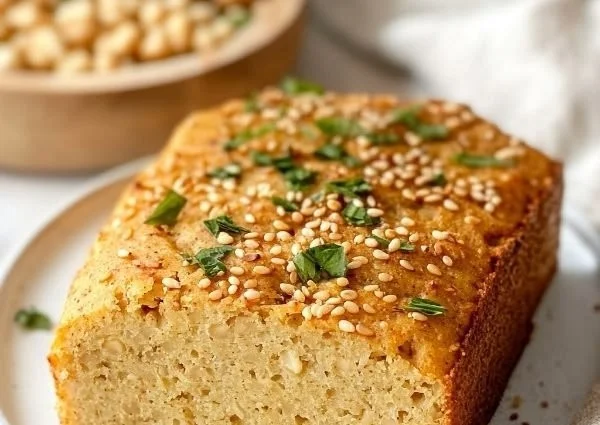 Homemade flourless chickpea bread sliced and ready to serve.