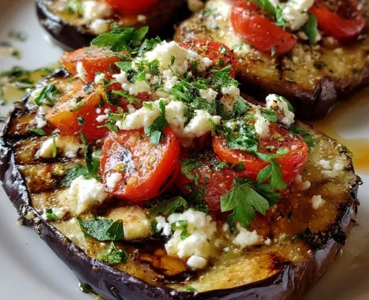Delicious Greek style roasted eggplant served with herbs and spices