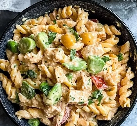 High-protein tuna pasta salad with fresh ingredients for a nutritious meal.
