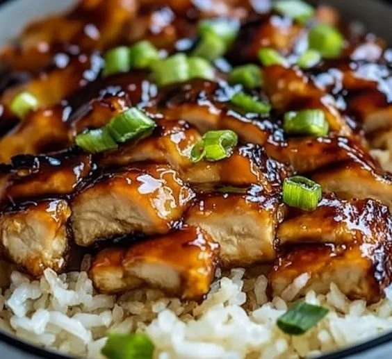 Honey BBQ Chicken Rice dish with vibrant colors and garnishes.