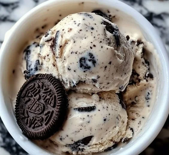 Delicious Ninja Creami Oreo cookie ice cream served in a bowl with Oreo toppings.