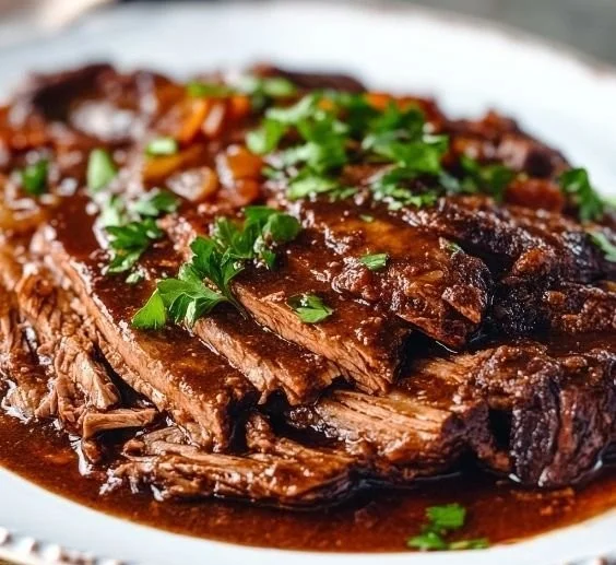Tender braised beef brisket served with vegetables and gravy