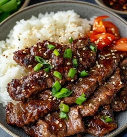 Grilled Beef Yakiniku served with dipping sauces and vegetables