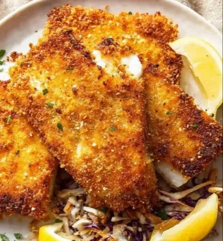Panko-crusted fried fish served with lemon and tartar sauce