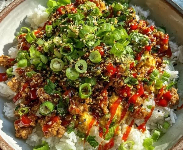 Spicy Bang Bang Turkey Rice Bowl with vibrant ingredients and sauce