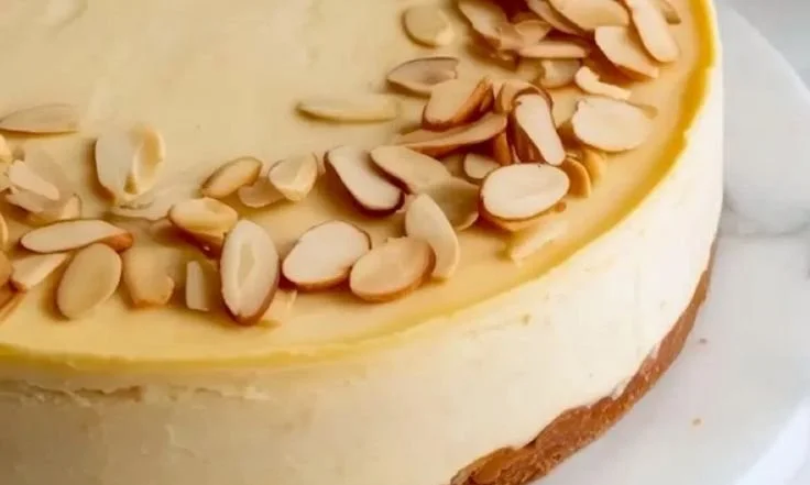Delicious Amaretto Cheesecake slice with creamy texture and almond topping
