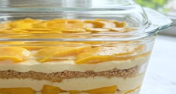 Delicious and creamy Mango Float dessert with fresh mango slices