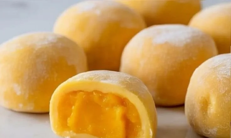 Delicious Mango Mochi dessert with a chewy texture and tropical flavor.