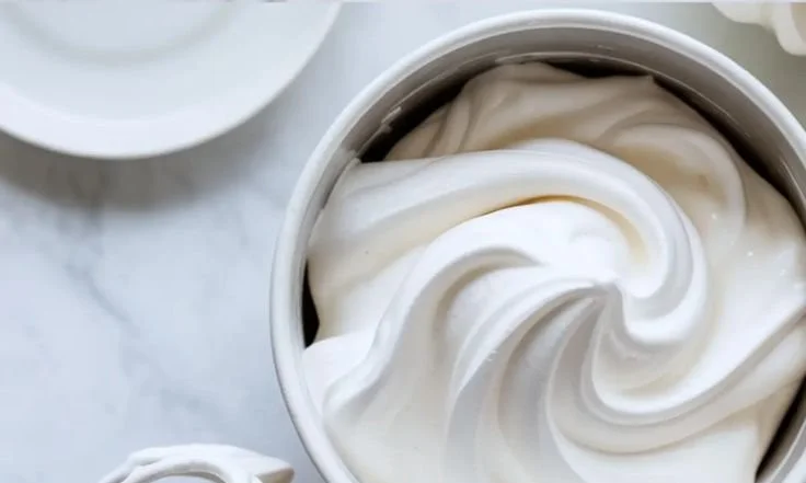Delicious marshmallow frosting on a chocolate cupcake