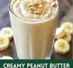 Peanut Butter Banana Smoothie topped with banana slices and peanuts